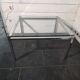 Chrome metal coffee table with a glass top from the 1970s.