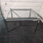Chrome metal coffee table with a glass top from the 1970s.
