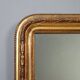 Antique carved and gilded wooden mirror, Italy, early 20th century.
