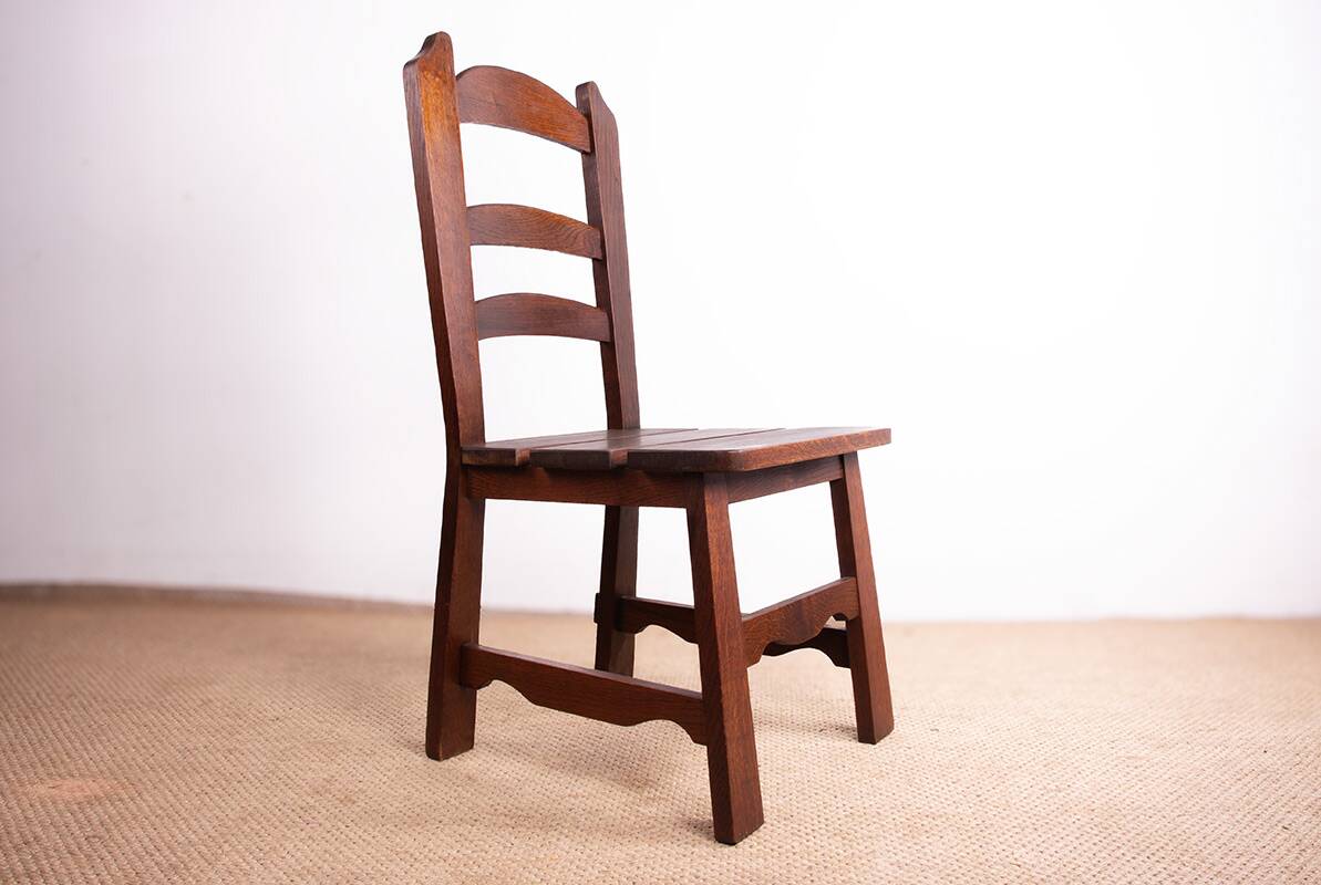 Set of 6 large Brutalist chairs in solid oak from the 1950s.