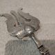 Fish serving fork with 950 silver handle, rococo cherub design