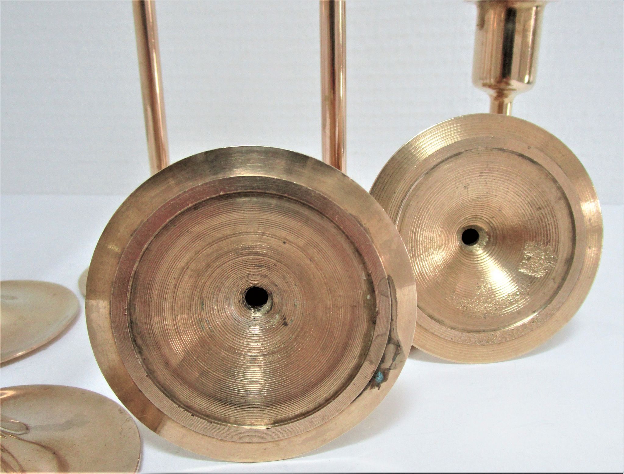 Series of seven candle holders solid brass