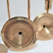 Series of seven candle holders solid brass