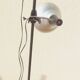 Industrial-style floor lamp with two large adjustable removable spotlights