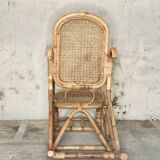Rocking-chair en rotin et cannage