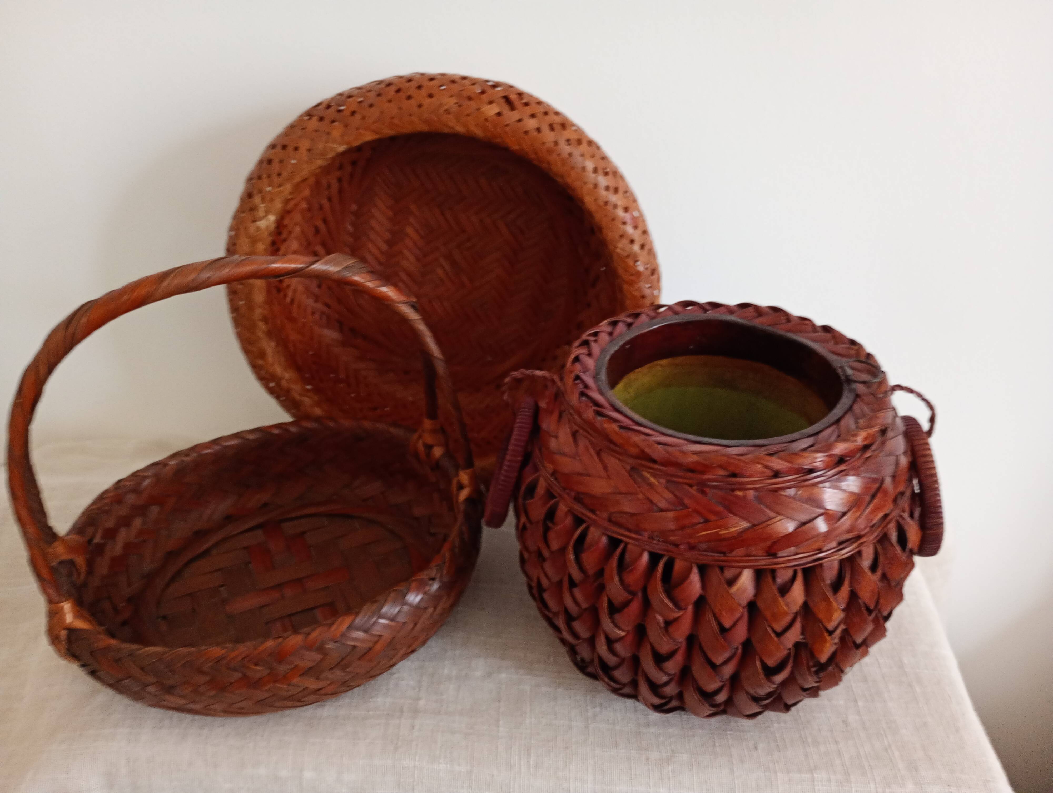 Japanese vase made of woven bamboo. Ikebana.