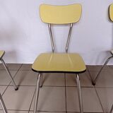 4 yellow Formica chairs