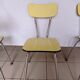 4 yellow Formica chairs