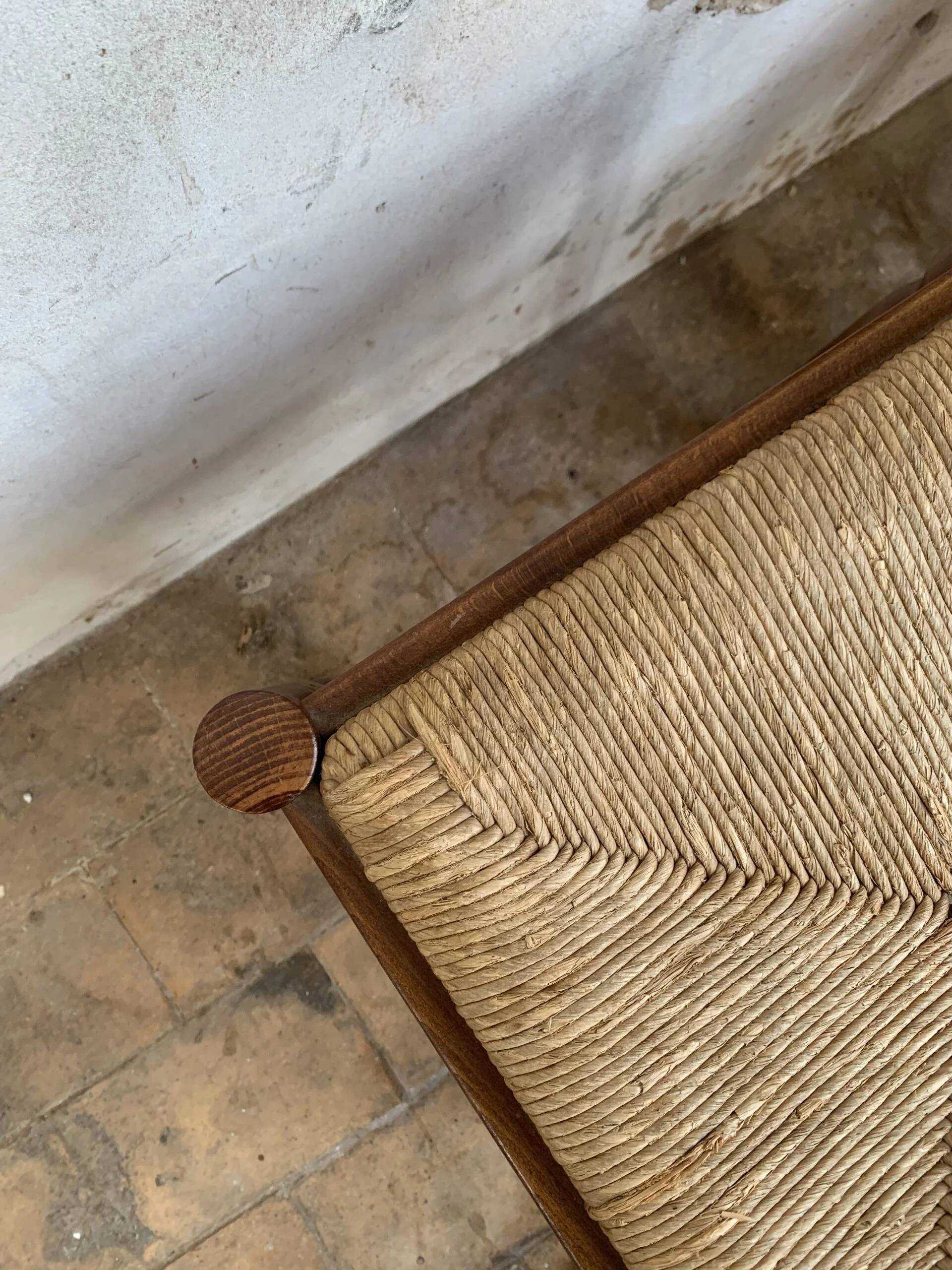 Pair of 20th-century wooden stools with straw seats