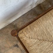 Pair of 20th-century wooden stools with straw seats
