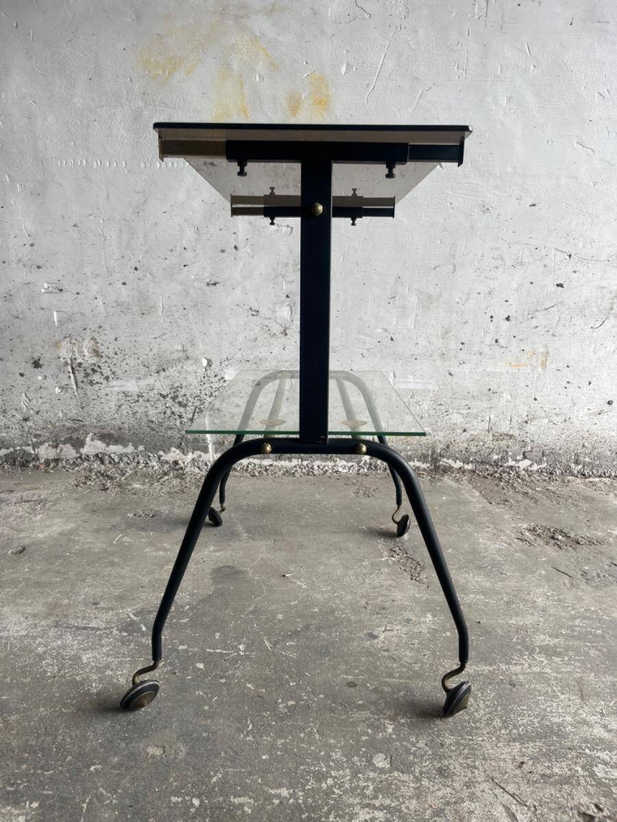 Black brass and glass mid-century trolley with sculptural legs — two-tier vintage bar cart