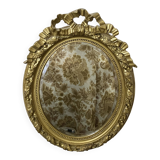 Miroir ancien ovale doré – style Louis XVI avec nœud ruban