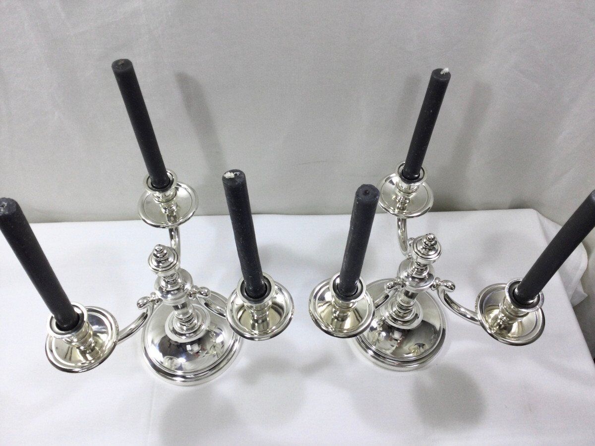 Pair of silver bronze candelabras
