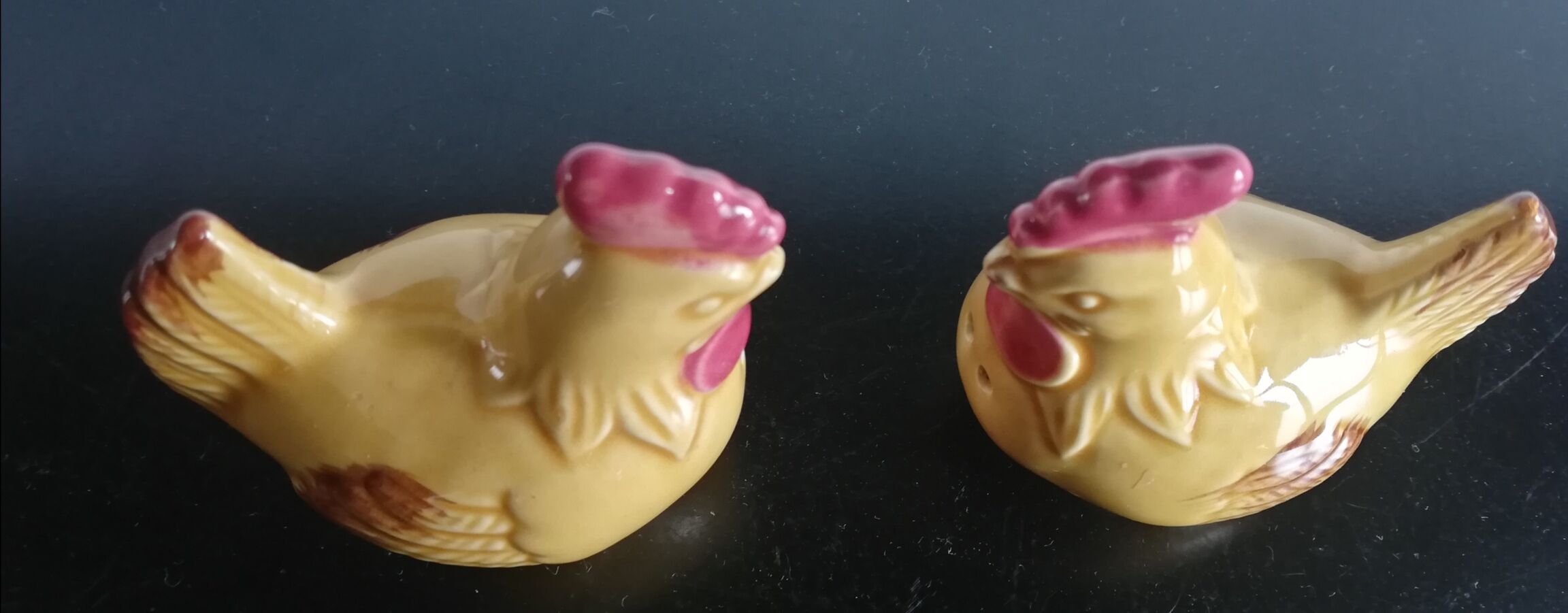 Yellow salt and pepper shaker in the shape of hens