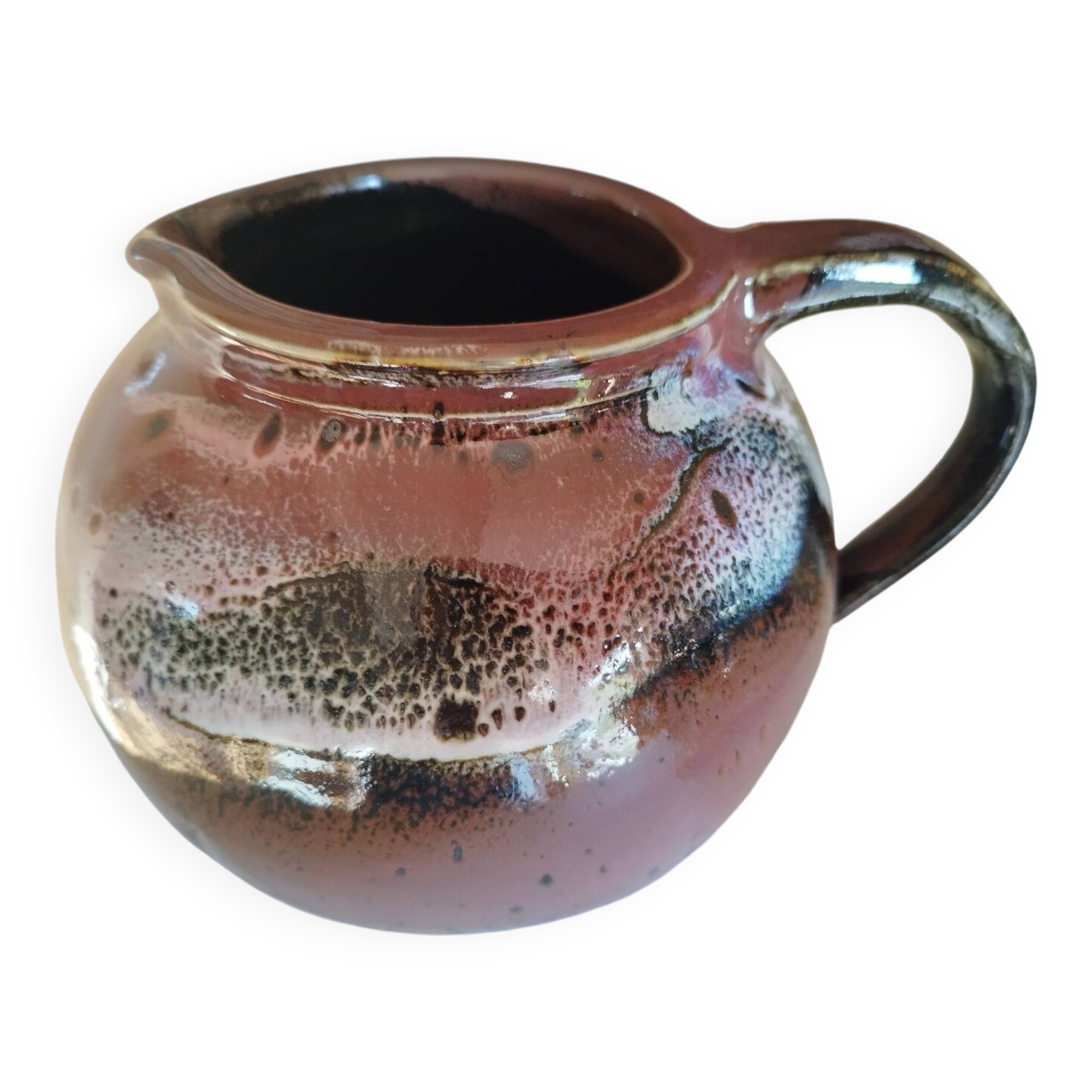 Stoneware pitcher by Matthieu Liévois in shades of red