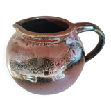 Stoneware pitcher by Matthieu Liévois in shades of red