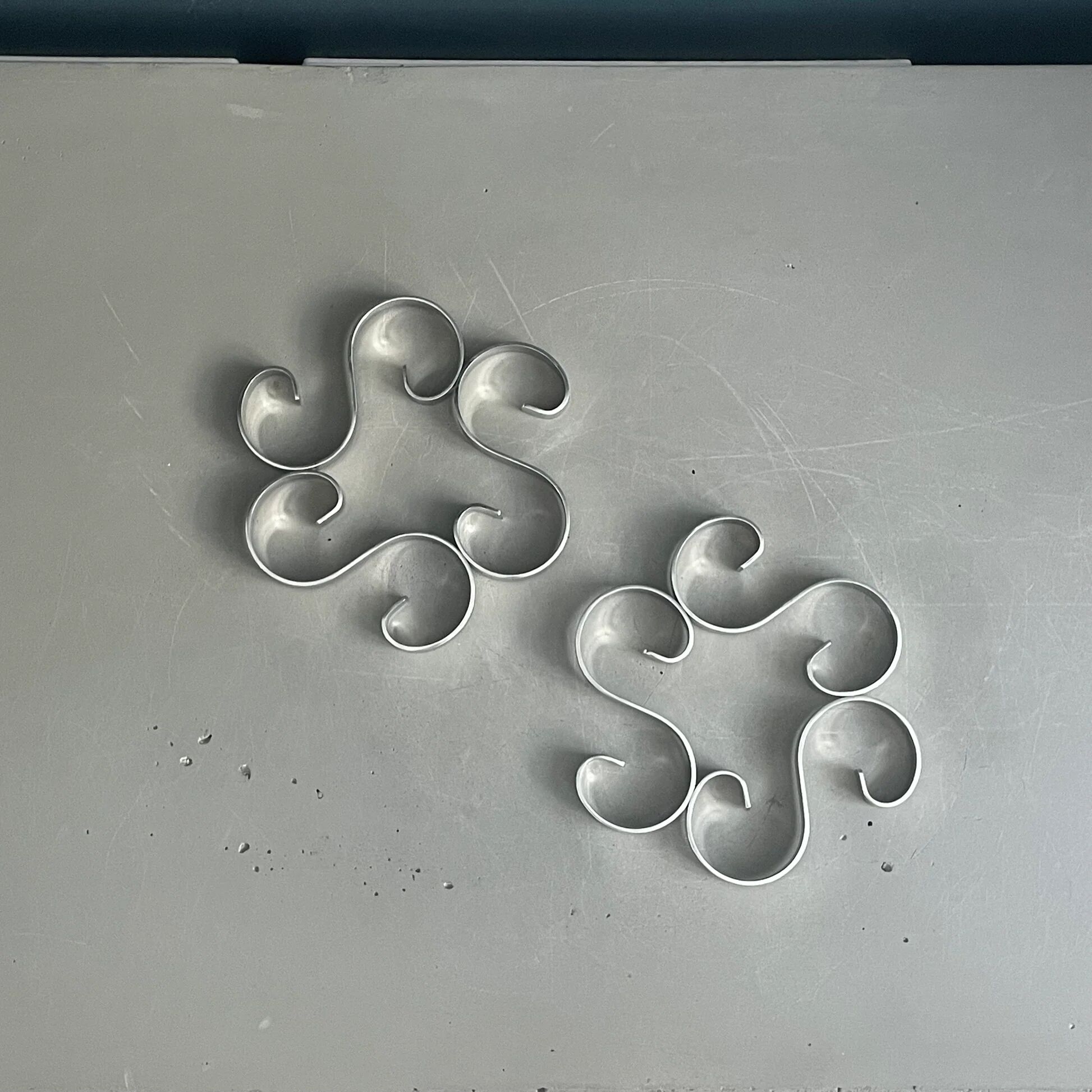 Pair of stainless steel trivets