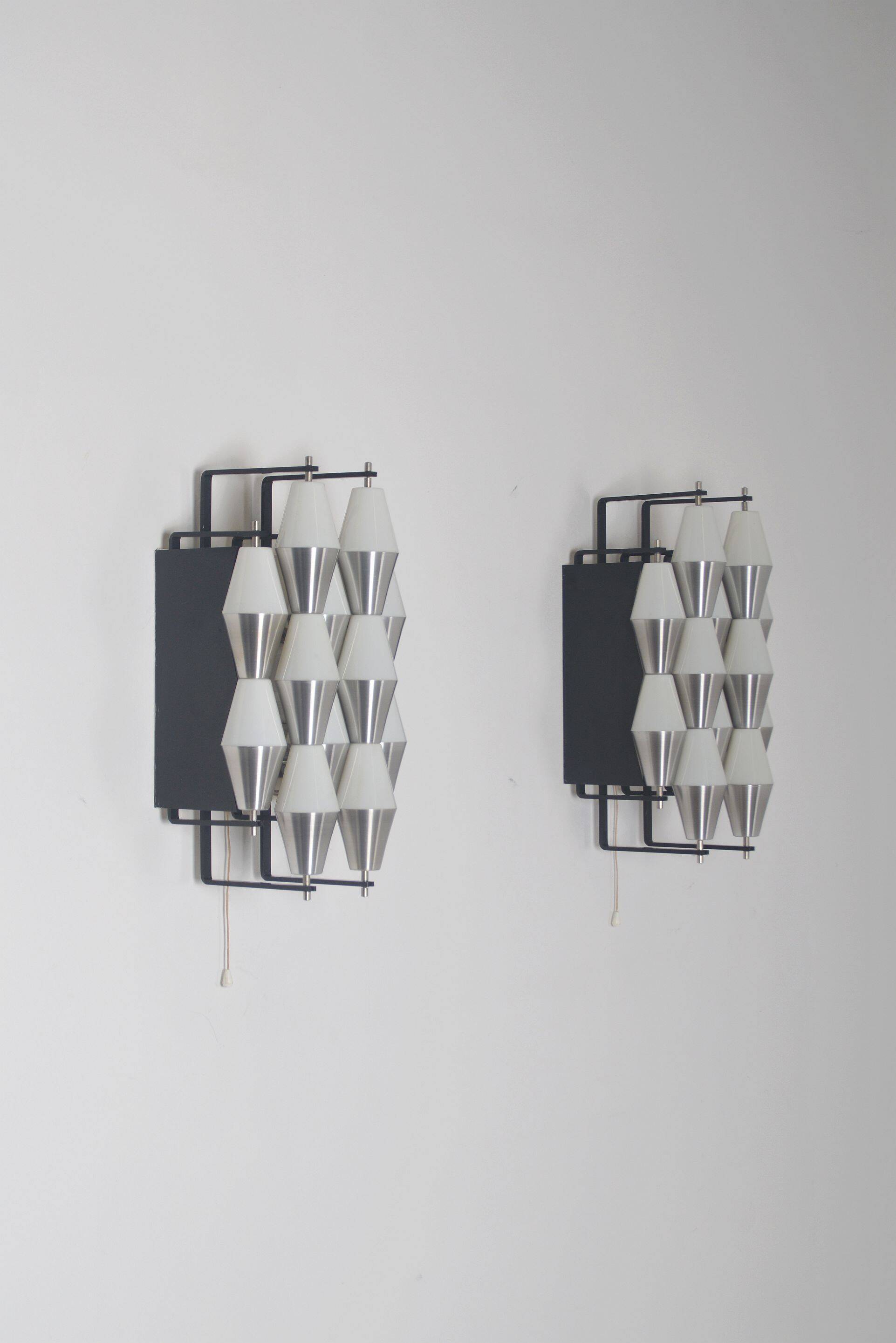 Rare set of wall lamps 'ludiek' by raak, 1960s