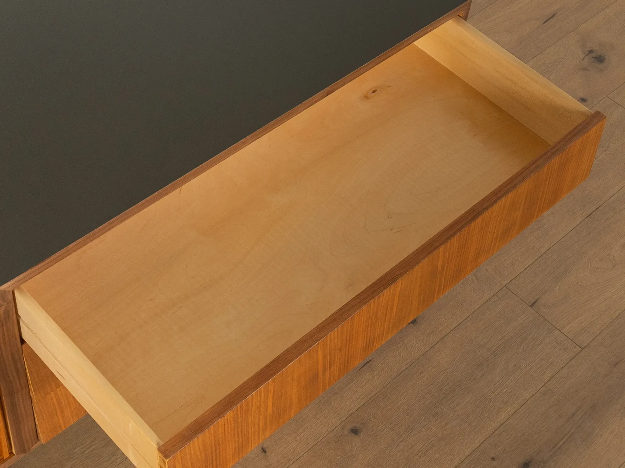 Striking mid-century sideboard with stainless steel base