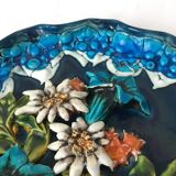 Decorative plate in relief with floral motif