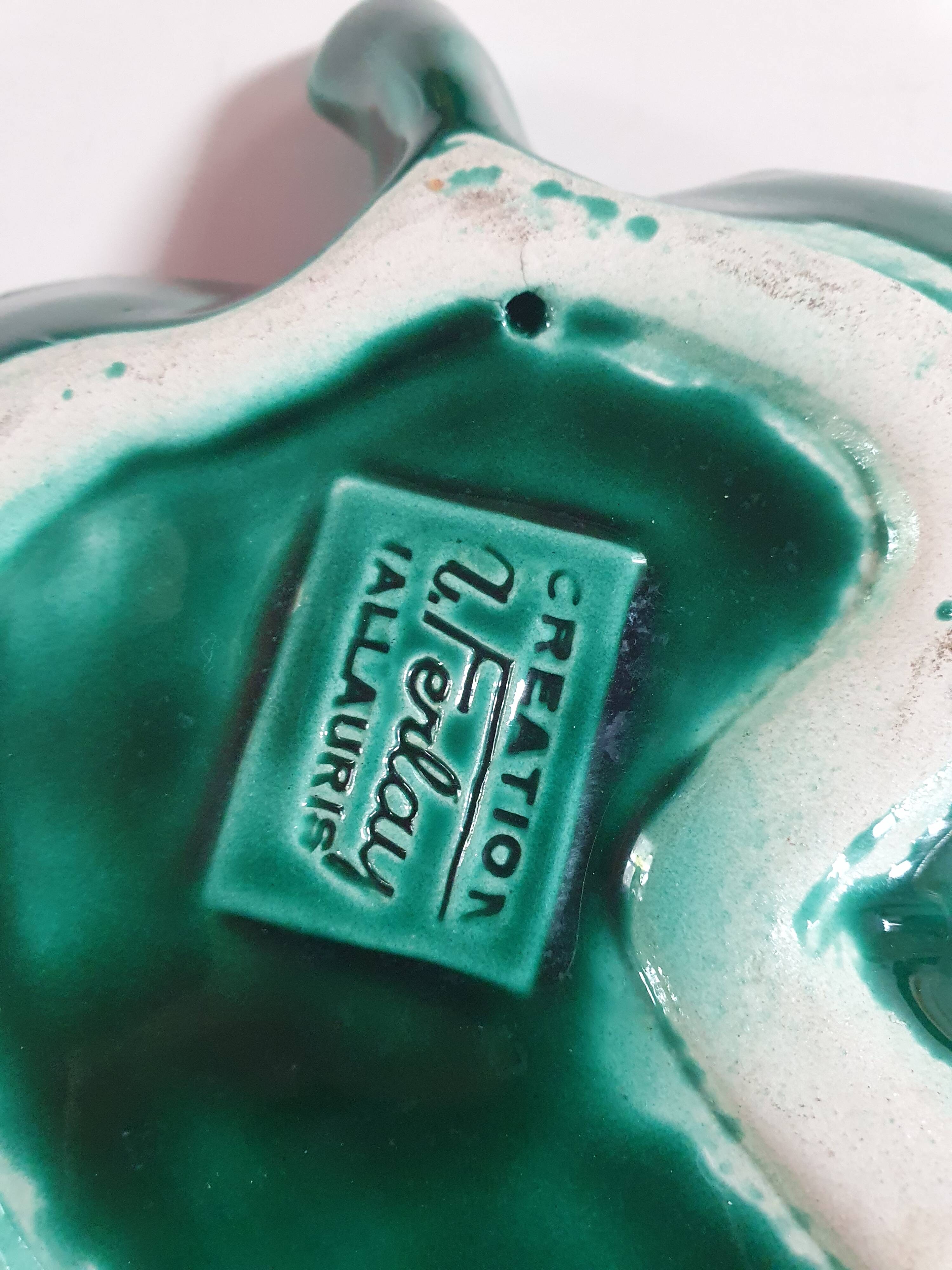 Empty pocket dish in green ceramic barbotine in Ferlay Vallauris, a small sparkle 17cm by 14cm