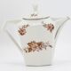 Lot teapot and sugar flowers in ancient ceramic
