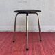 Tabouret vintage en skaï noir