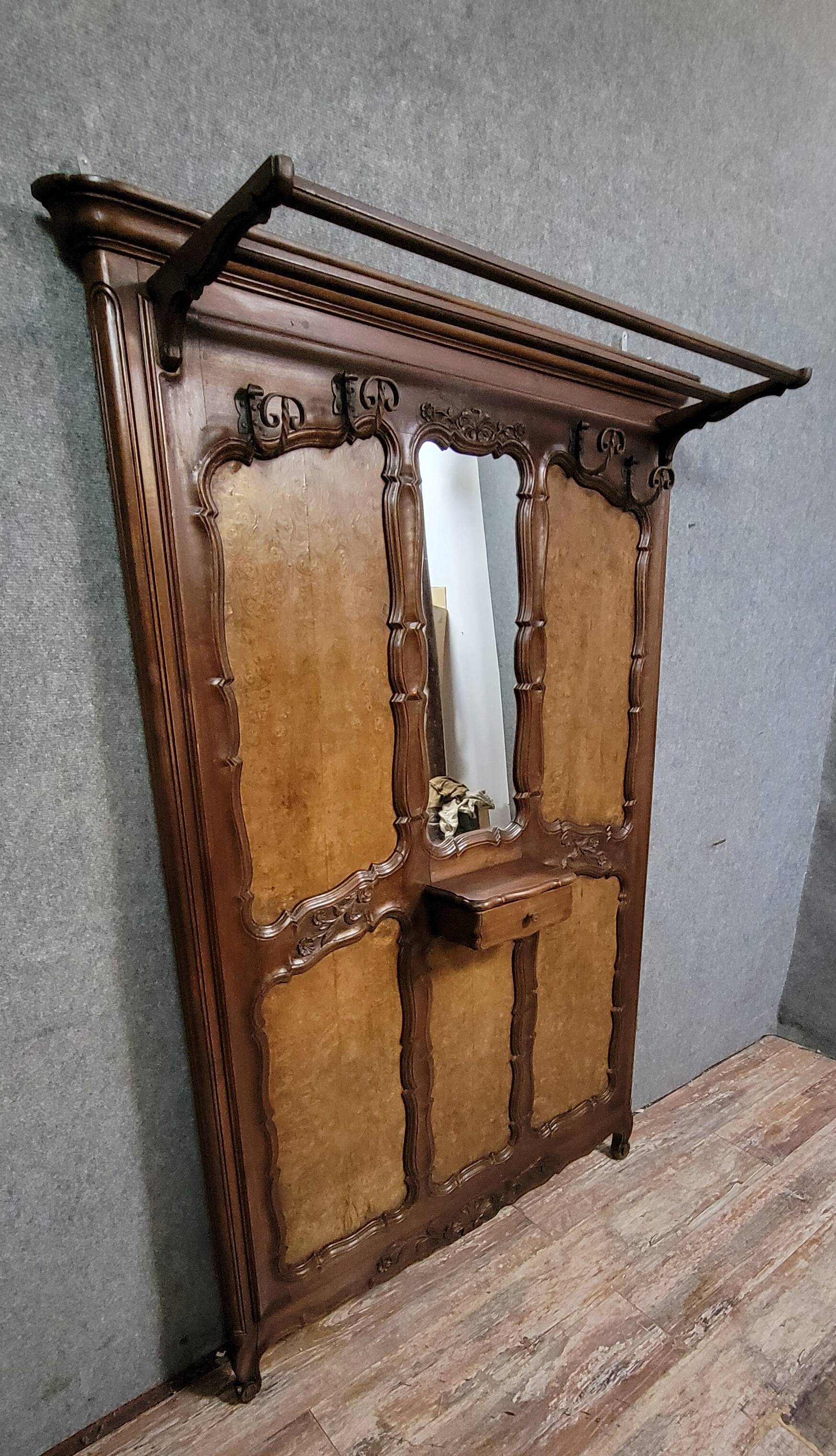 Large coat rack in Louis XV style, made of walnut and elm burl.