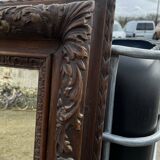 Large carved wooden mirror