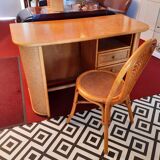 Desk with vintage rattan chair