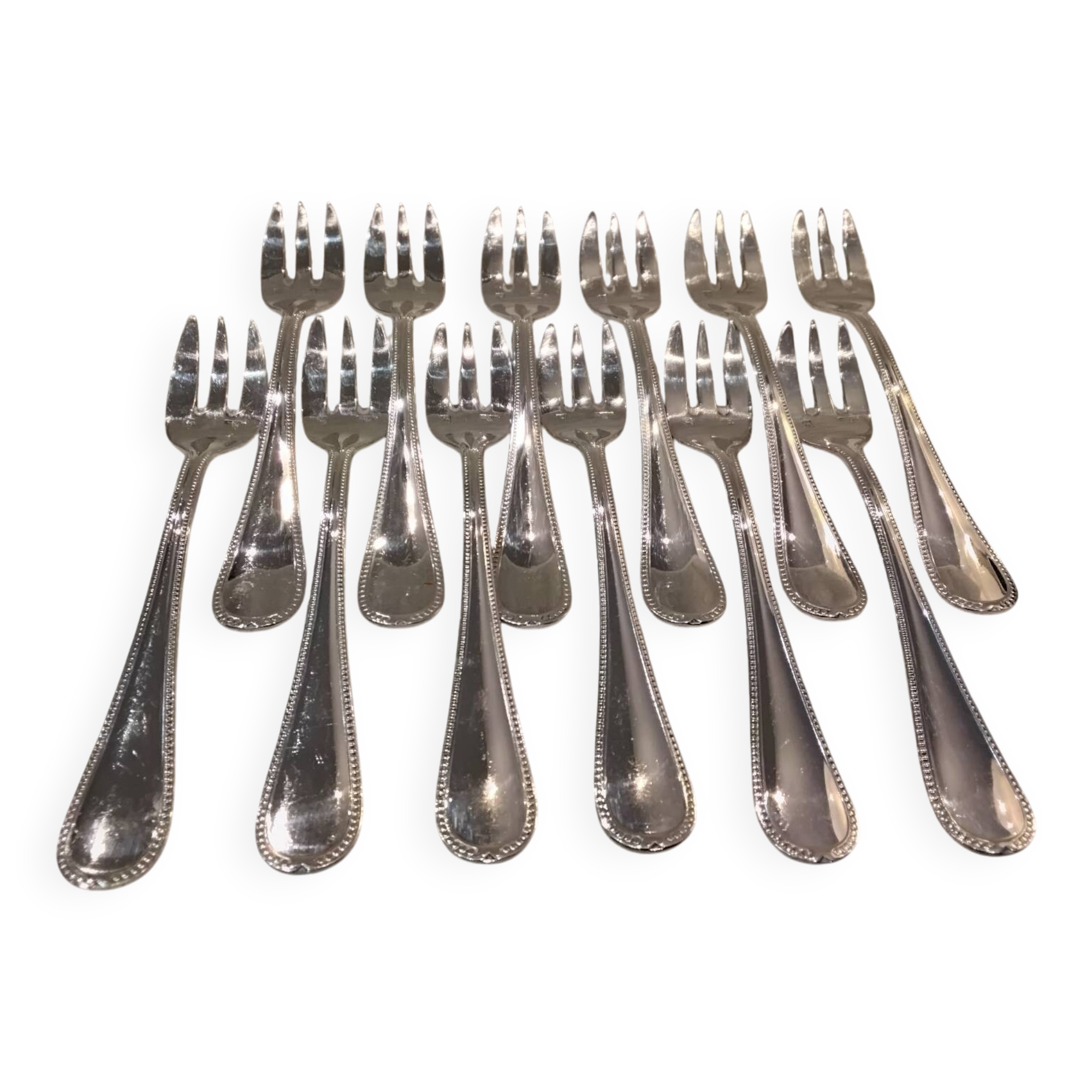 12 silver-plated oyster forks by the silversmith Ercuis, 12.2 cm