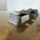 Large brutalist candlestick in the style of the Marolles workshops, raw steel.