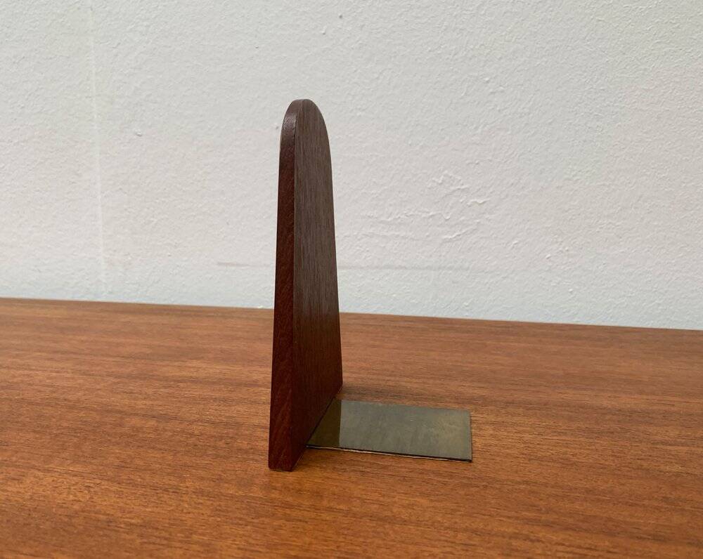 Mid-century Scandinavian bookends in teak and brass.