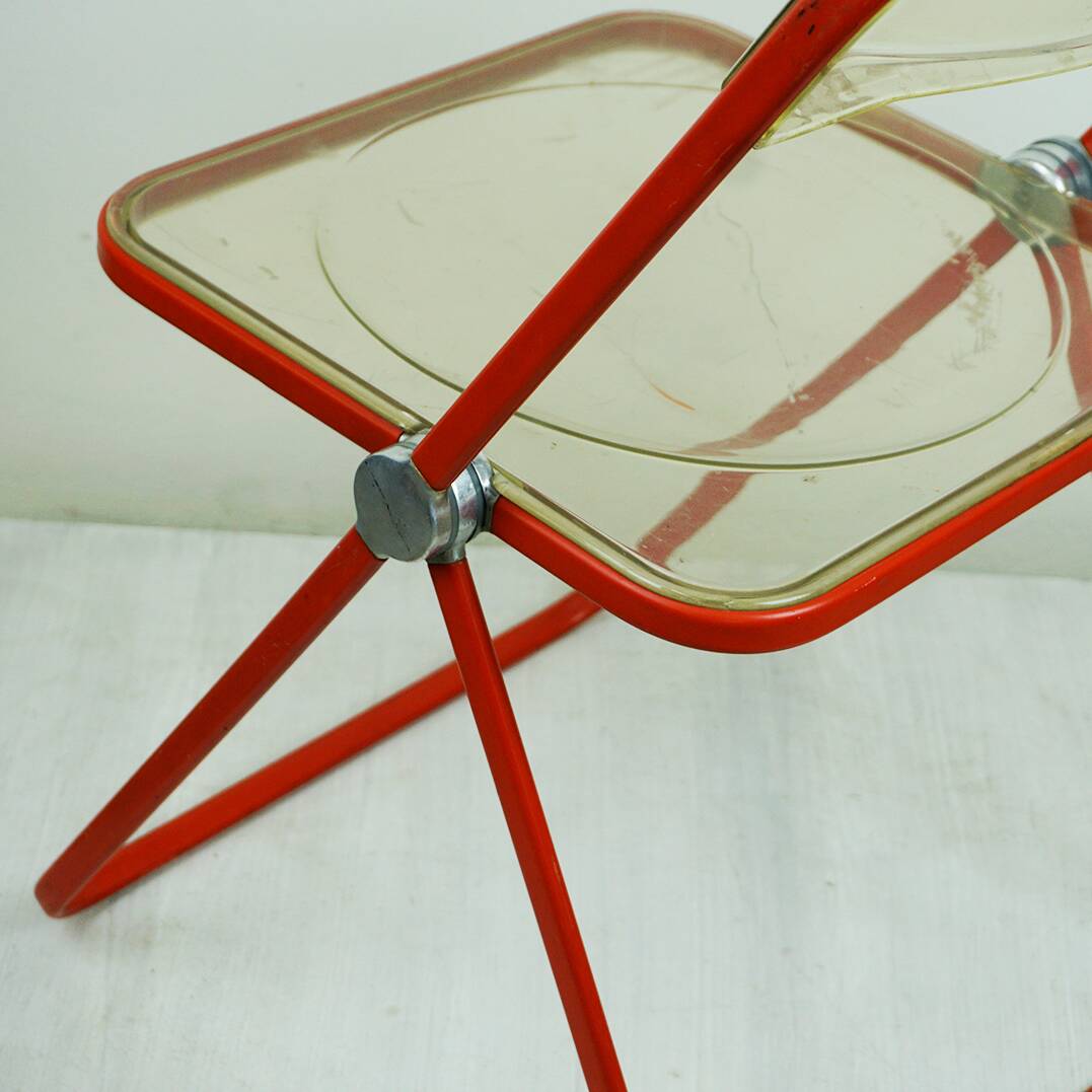 Red Plia Lucite folding chair by G. Piretti for Castelli Italy