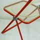 Red Plia Lucite folding chair by G. Piretti for Castelli Italy