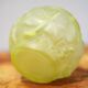 Fluorescent yellow ball vase with vine leaf patterns