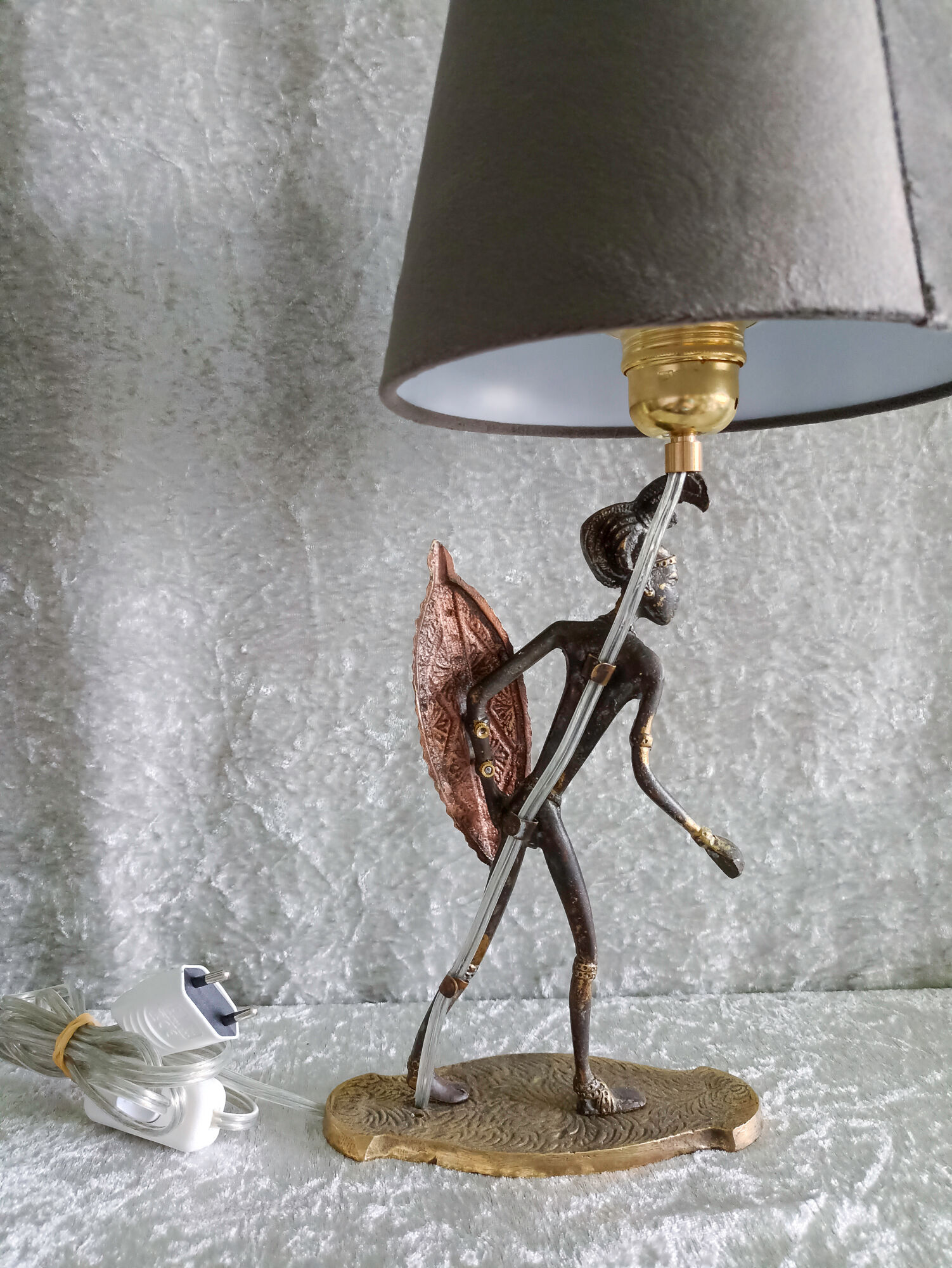 African warrior lamp in bronze.