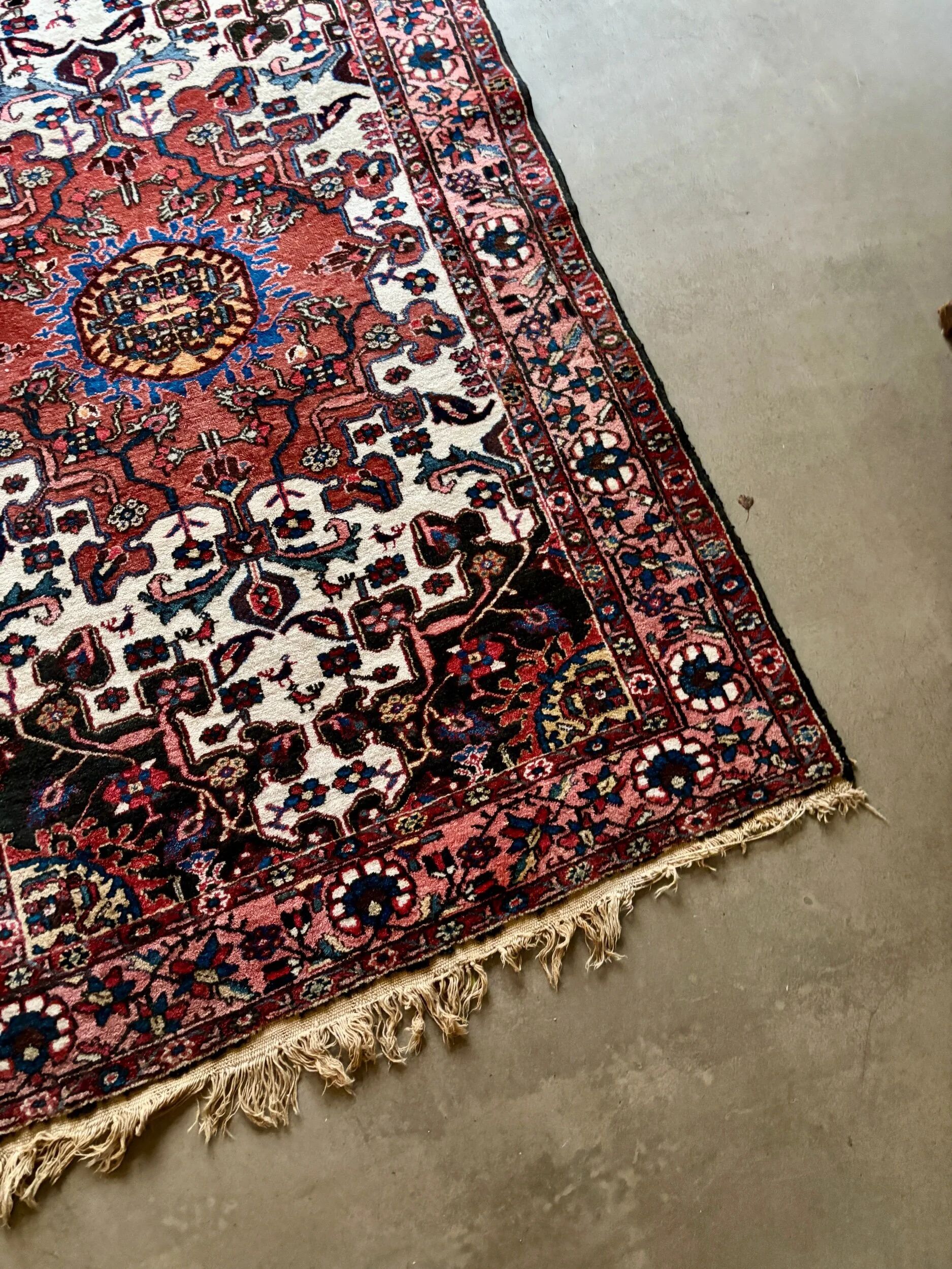 Persian carpet in wool and silk, old rose.