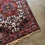 Persian carpet in wool and silk, old rose.