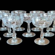 Series of 11 cut crystal champagne glasses