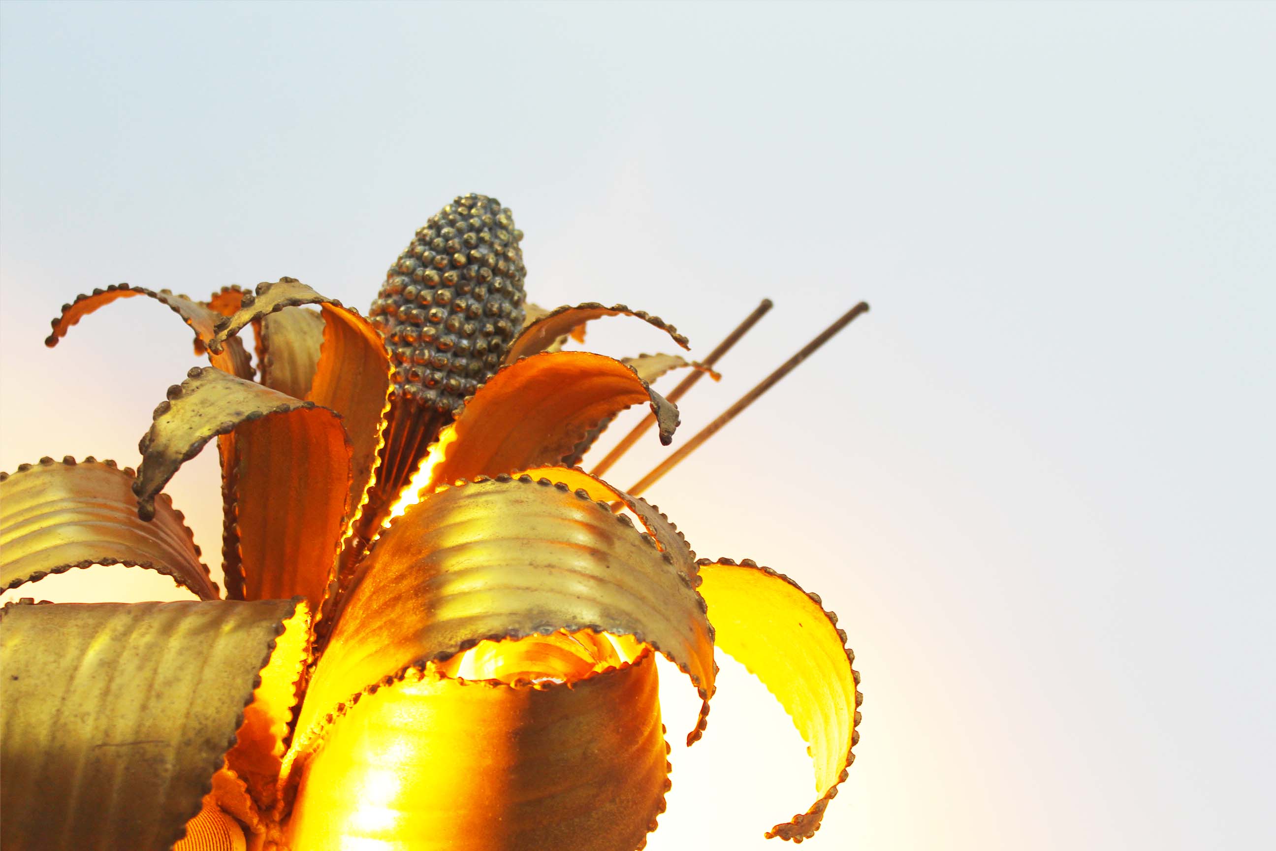 Brass torch cut 'corn cob' wall lamp