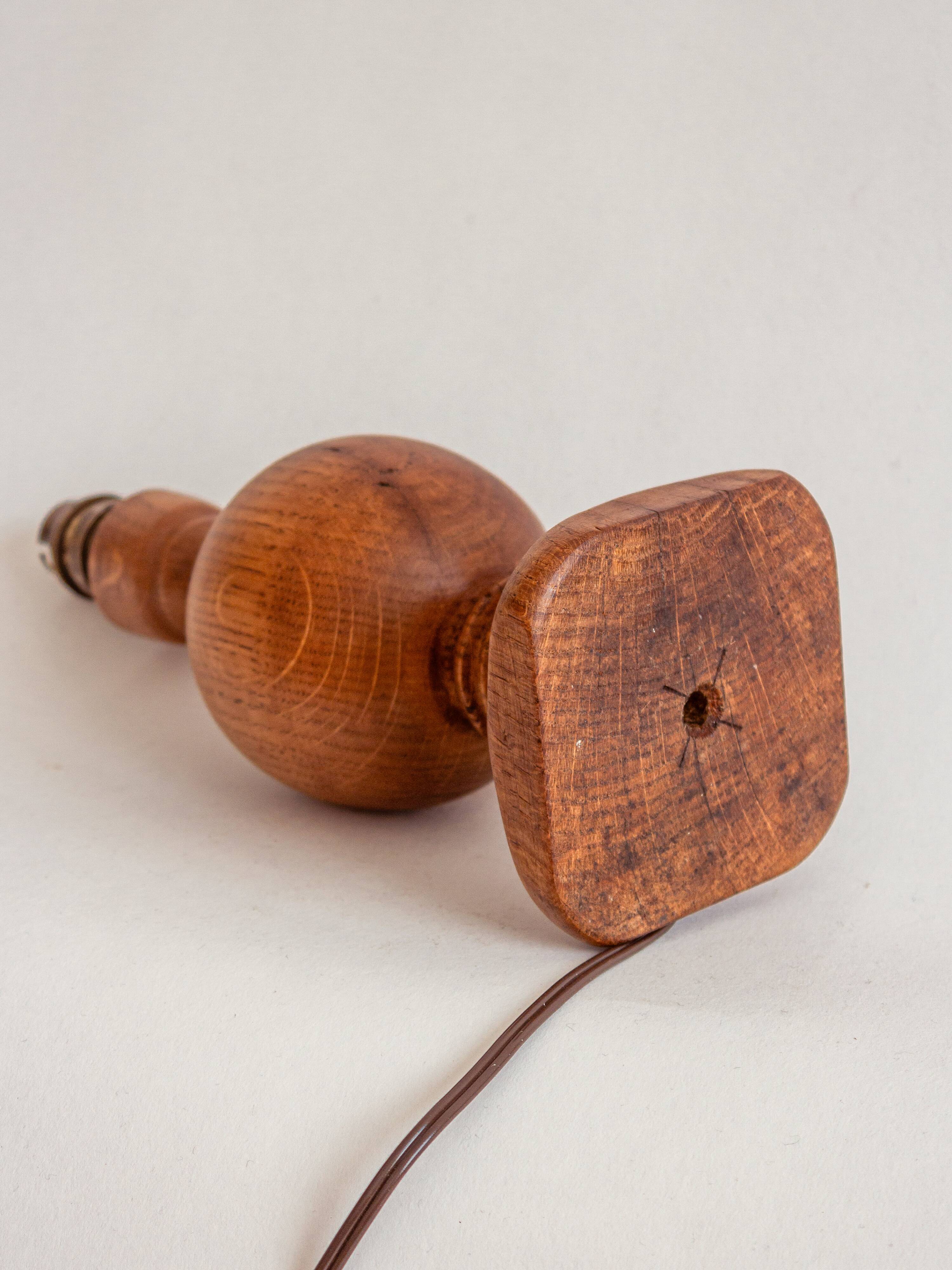 2 turned wooden lamp bases, 1940s-1960s