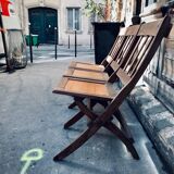 Banc de cinéma en bois pliable vintage.