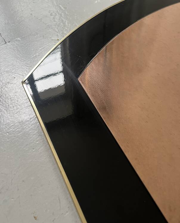 Large brass mirror and pink glass circa 1970