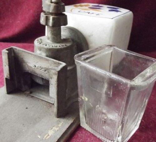 Old wall-mounted coffee grinder