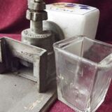 Old wall-mounted coffee grinder