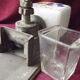 Old wall-mounted coffee grinder