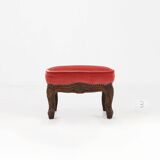 Baroque style foot stool in carved wood with coral velvet upholstery