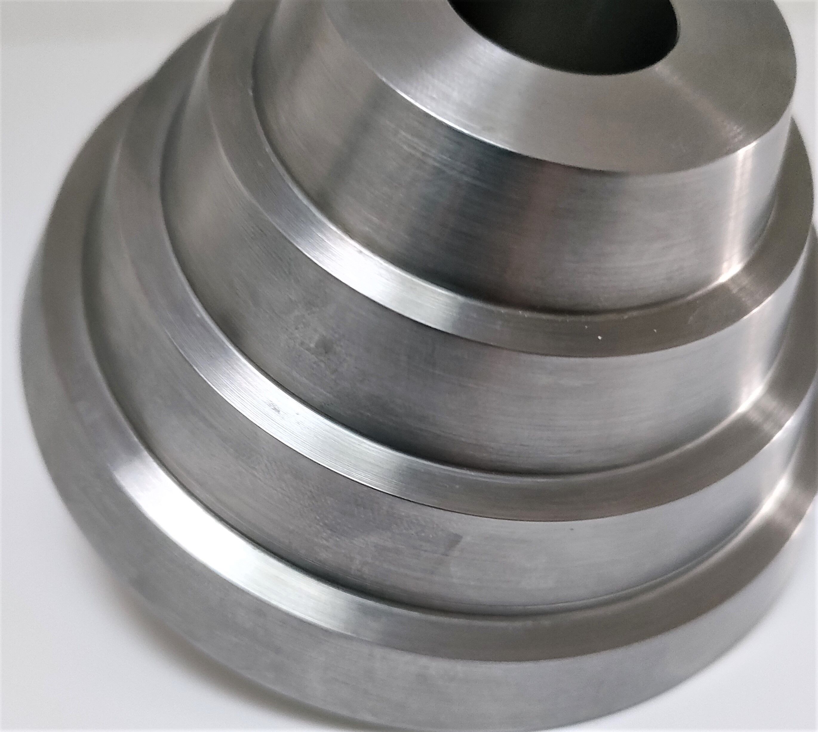 Solid steel candle holder turned design
