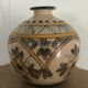 Vintage vase shaped terracotta ball with handheld paint decoration polychrome signed